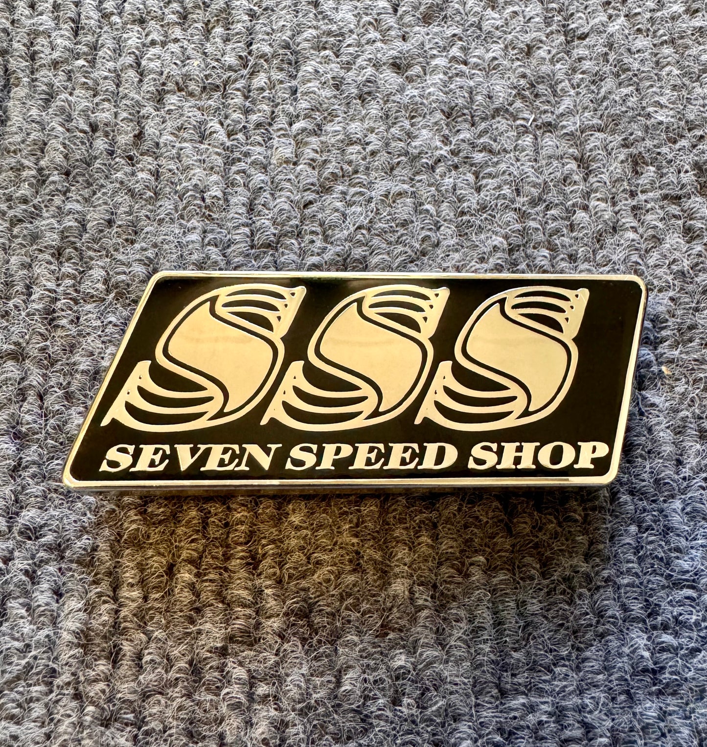 7 Speed Shop Grille Badge