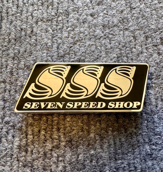 7 Speed Shop Grille Badge